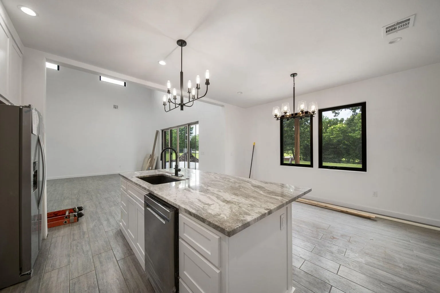 New build kitchen with ceiling fan and natural light